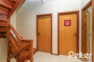 Casa em Condomínio à venda com 133m², 3 dormitórios, 1 suíte, 2 vagas, no bairro Tristeza em Porto Alegre