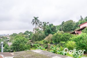 Casa em Condomínio à venda com 133m², 3 dormitórios, 1 suíte, 2 vagas, no bairro Tristeza em Porto Alegre