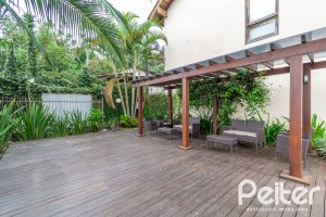 Casa em Condomínio à venda com 133m², 3 dormitórios, 1 suíte, 2 vagas, no bairro Tristeza em Porto Alegre