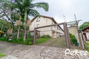 Casa em Condomínio à venda com 133m², 3 dormitórios, 1 suíte, 2 vagas, no bairro Tristeza em Porto Alegre