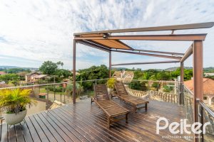 Casa em Condomínio à venda com 181m², 3 dormitórios, 1 suíte, 2 vagas, no bairro Ipanema em Porto Alegre