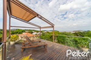 Casa em Condomínio à venda com 181m², 3 dormitórios, 1 suíte, 2 vagas, no bairro Ipanema em Porto Alegre