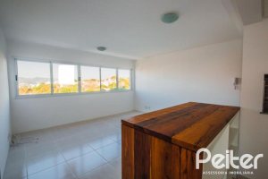 Apartamento à venda com 65m², 2 dormitórios, 1 suíte, 2 vagas, no bairro Tristeza em PORTO ALEGRE