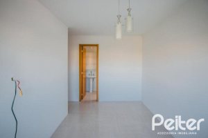 Apartamento à venda com 65m², 2 dormitórios, 1 suíte, 2 vagas, no bairro Tristeza em PORTO ALEGRE