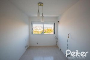 Apartamento à venda com 65m², 2 dormitórios, 1 suíte, 2 vagas, no bairro Tristeza em PORTO ALEGRE