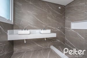 Casa em Condomínio à venda com 256m², 3 dormitórios, 3 suítes, 2 vagas, no bairro Hipica em PORTO ALEGRE