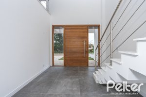Casa em Condomínio à venda com 256m², 3 dormitórios, 3 suítes, 2 vagas, no bairro Hipica em PORTO ALEGRE
