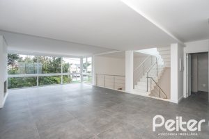 Casa em Condomínio à venda com 256m², 3 dormitórios, 3 suítes, 2 vagas, no bairro Hipica em PORTO ALEGRE