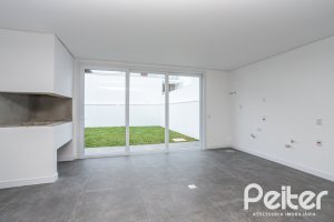 Casa em Condomínio à venda com 256m², 3 dormitórios, 3 suítes, 2 vagas, no bairro Hipica em PORTO ALEGRE