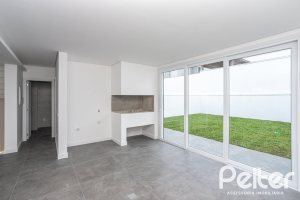 Casa em Condomínio à venda com 256m², 3 dormitórios, 3 suítes, 2 vagas, no bairro Hipica em PORTO ALEGRE