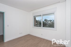 Casa em Condomínio à venda com 256m², 3 dormitórios, 3 suítes, 2 vagas, no bairro Hipica em PORTO ALEGRE