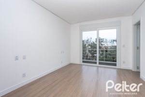 Casa em Condomínio à venda com 256m², 3 dormitórios, 3 suítes, 2 vagas, no bairro Hipica em PORTO ALEGRE