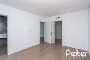 Casa em Condomínio à venda com 256m², 3 dormitórios, 3 suítes, 2 vagas, no bairro Hipica em PORTO ALEGRE