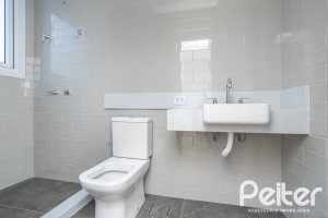 Casa em Condomínio à venda com 256m², 3 dormitórios, 3 suítes, 2 vagas, no bairro Hipica em PORTO ALEGRE