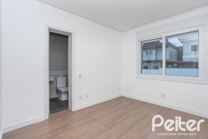 Casa em Condomínio à venda com 256m², 3 dormitórios, 3 suítes, 2 vagas, no bairro Hipica em PORTO ALEGRE