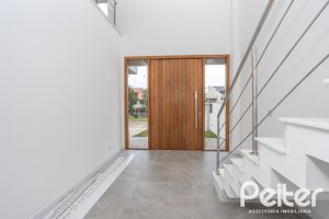 Casa em Condomínio à venda com 254m², 3 dormitórios, 3 suítes, 2 vagas, no bairro Hipica em PORTO ALEGRE