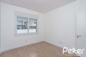 Casa em Condomínio à venda com 254m², 3 dormitórios, 3 suítes, 2 vagas, no bairro Hipica em PORTO ALEGRE