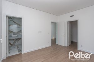 Casa em Condomínio à venda com 254m², 3 dormitórios, 3 suítes, 2 vagas, no bairro Hipica em PORTO ALEGRE