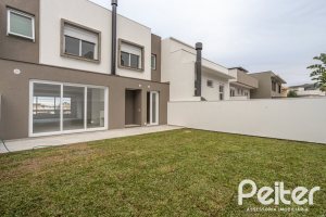 Casa em Condomínio à venda com 254m², 3 dormitórios, 3 suítes, 2 vagas, no bairro Hipica em PORTO ALEGRE