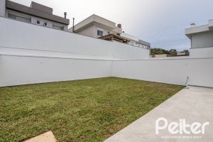 Casa em Condomínio à venda com 254m², 3 dormitórios, 3 suítes, 2 vagas, no bairro Hipica em PORTO ALEGRE
