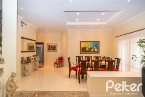 Casa em Condomínio à venda com 477m², 3 dormitórios, 1 suíte, 3 vagas, no bairro Nonoai em Porto Alegre