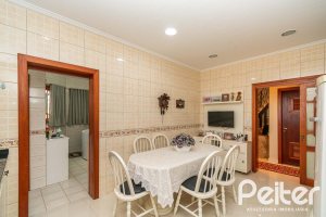 Casa em Condomínio à venda com 477m², 3 dormitórios, 1 suíte, 3 vagas, no bairro Nonoai em Porto Alegre