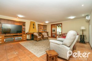 Casa em Condomínio à venda com 477m², 3 dormitórios, 1 suíte, 3 vagas, no bairro Nonoai em Porto Alegre