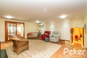 Casa em Condomínio à venda com 477m², 3 dormitórios, 1 suíte, 3 vagas, no bairro Nonoai em Porto Alegre