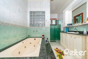 Casa em Condomínio à venda com 477m², 3 dormitórios, 1 suíte, 3 vagas, no bairro Nonoai em Porto Alegre