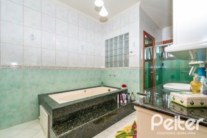 Casa em Condomínio à venda com 477m², 3 dormitórios, 1 suíte, 3 vagas, no bairro Nonoai em Porto Alegre