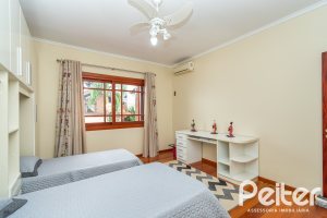 Casa em Condomínio à venda com 477m², 3 dormitórios, 1 suíte, 3 vagas, no bairro Nonoai em Porto Alegre