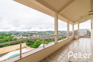 Casa em Condomínio à venda com 477m², 3 dormitórios, 1 suíte, 3 vagas, no bairro Nonoai em Porto Alegre