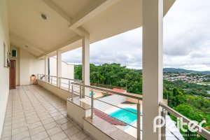 Casa em Condomínio à venda com 477m², 3 dormitórios, 1 suíte, 3 vagas, no bairro Nonoai em Porto Alegre