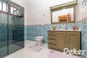 Casa em Condomínio à venda com 477m², 3 dormitórios, 1 suíte, 3 vagas, no bairro Nonoai em Porto Alegre