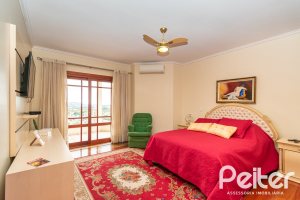 Casa em Condomínio à venda com 477m², 3 dormitórios, 1 suíte, 3 vagas, no bairro Nonoai em Porto Alegre