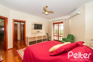 Casa em Condomínio à venda com 477m², 3 dormitórios, 1 suíte, 3 vagas, no bairro Nonoai em Porto Alegre