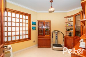 Casa em Condomínio à venda com 477m², 3 dormitórios, 1 suíte, 3 vagas, no bairro Nonoai em Porto Alegre