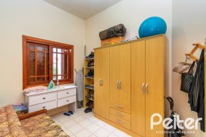 Casa em Condomínio à venda com 477m², 3 dormitórios, 1 suíte, 3 vagas, no bairro Nonoai em Porto Alegre