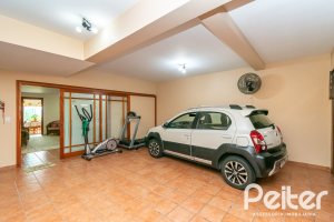 Casa em Condomínio à venda com 477m², 3 dormitórios, 1 suíte, 3 vagas, no bairro Nonoai em Porto Alegre