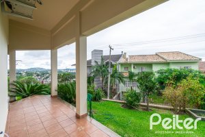 Casa em Condomínio à venda com 477m², 3 dormitórios, 1 suíte, 3 vagas, no bairro Nonoai em Porto Alegre