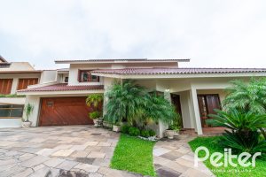 Casa em Condomínio à venda com 477m², 3 dormitórios, 1 suíte, 3 vagas, no bairro Nonoai em Porto Alegre