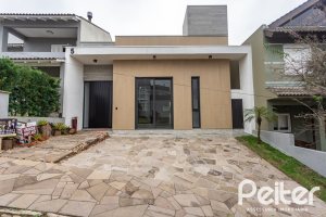 Casa em Condomínio à venda com 174m², 3 dormitórios, 3 suítes, 2 vagas, no bairro Hipica em PORTO ALEGRE