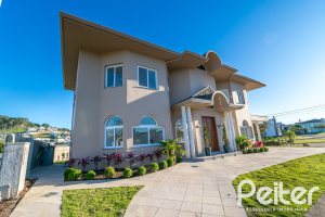 Casa em Condomínio à venda com 345m², 3 dormitórios, 3 suítes, 4 vagas, no bairro Alphaville em PORTO ALEGRE