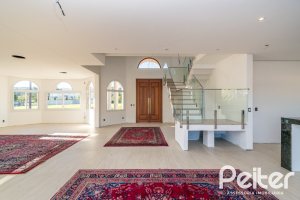 Casa em Condomínio à venda com 345m², 3 dormitórios, 3 suítes, 4 vagas, no bairro Alphaville em PORTO ALEGRE