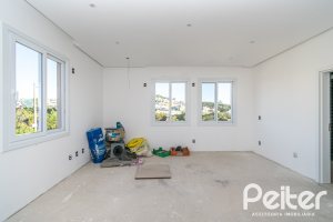 Casa em Condomínio à venda com 345m², 3 dormitórios, 3 suítes, 4 vagas, no bairro Alphaville em PORTO ALEGRE