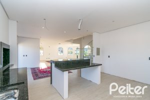 Casa em Condomínio à venda com 345m², 3 dormitórios, 3 suítes, 4 vagas, no bairro Alphaville em PORTO ALEGRE