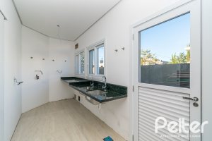 Casa em Condomínio à venda com 345m², 3 dormitórios, 3 suítes, 4 vagas, no bairro Alphaville em PORTO ALEGRE