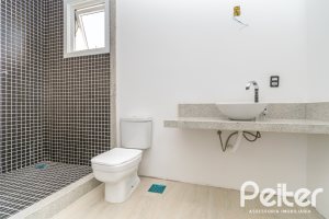 Casa em Condomínio à venda com 345m², 3 dormitórios, 3 suítes, 4 vagas, no bairro Alphaville em PORTO ALEGRE