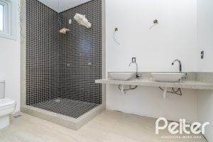 Casa em Condomínio à venda com 345m², 3 dormitórios, 3 suítes, 4 vagas, no bairro Alphaville em PORTO ALEGRE