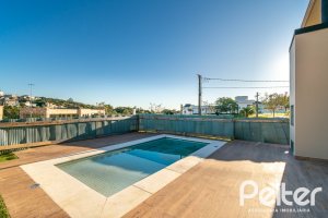 Casa em Condomínio à venda com 345m², 3 dormitórios, 3 suítes, 4 vagas, no bairro Alphaville em PORTO ALEGRE